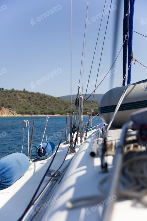 Preview: Fender buoys on sailboat side with ropes