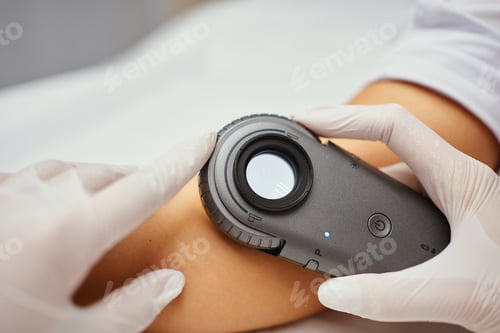 Preview: A dermatologist examines the skin.