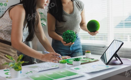 Preview: Colleagues developing sustainable business ecological strategies