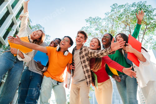 Preview: Portrait of a big group of smiling multiracial teenagers having fun outdoors. Cherful young people