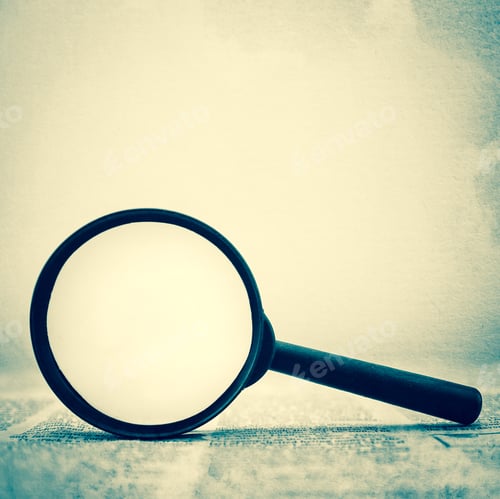 Preview: Newspaper And A Magnifying Glass