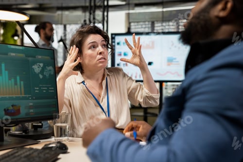 Preview: Businesswoman under pressure feeling frustrated with her coworker