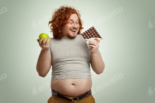 Preview: Junk food, unhealthy lifestyle, people, obesity and gluttony concept. Portrait of happy fat young re