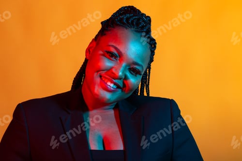 Preview: Beauty portrait fashion girl with color neon lighting filters. Beauty girl face close up. Closeup