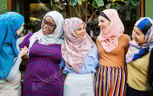 Preview: Smiling women chatting in a group together