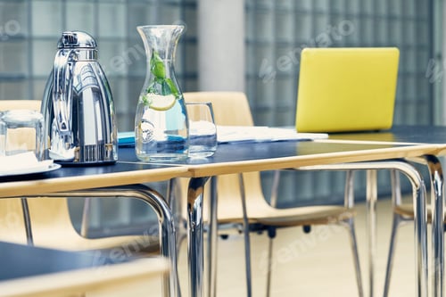 Preview: Refreshments and paperwork on boardroom table