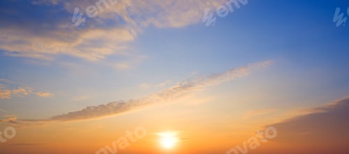 Preview: Sunrise sky in the morning with yellow sunlight and clouds on panoramic blue sky background