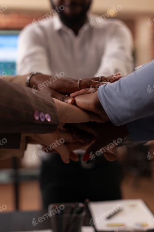 Preview: Excited successful diverse businessteam celebrating management partnership