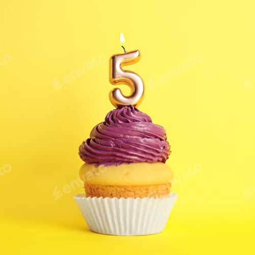 Preview: Birthday cupcake with number five candle on yellow background