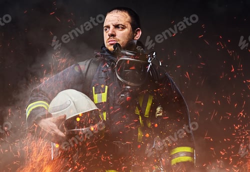 Preview: A firefighter dressed in a uniform in a studio.