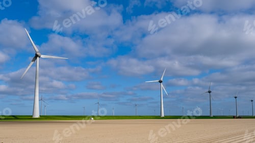 Preview: Windmill turbines at sea a huge winmill park in the Netherlands during winter