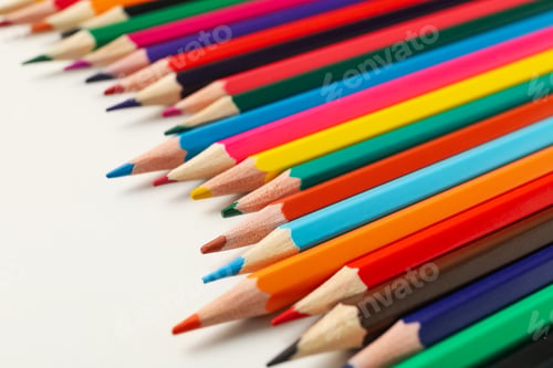 Preview: Colorful pencils on white background, close up