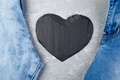 Preview: Denim. Jeans texture background. Valentine Day. Black Stone Slate heart. Copy space.