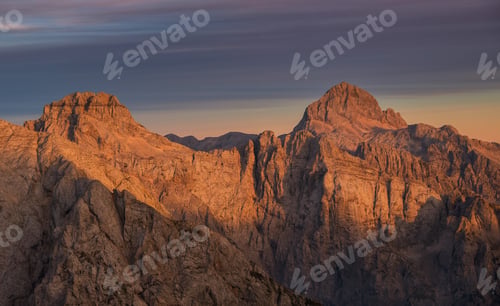 Preview: Majestic view of the mountains at sunset