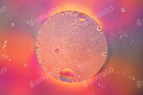 Preview: Abstract colorful background with oil on water surface. Oil drops in water abstract psychedelic.
