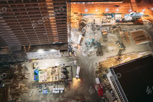 Preview: Development Multistorey Residential Building in night hours. development on construction site. night