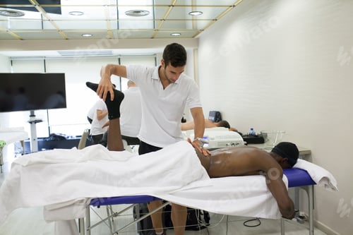 Preview: physiotherapist applying massage
