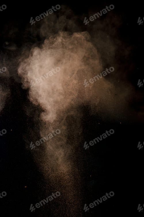 Preview: Cocoa powder explosion in motion. Chocolate dust on a black background. Action food photography.