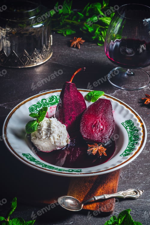 Preview: Poached pears in red wine with cinnamon and anise.