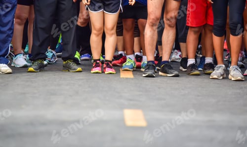Preview: Marathoners are waiting to be released at the starting line.