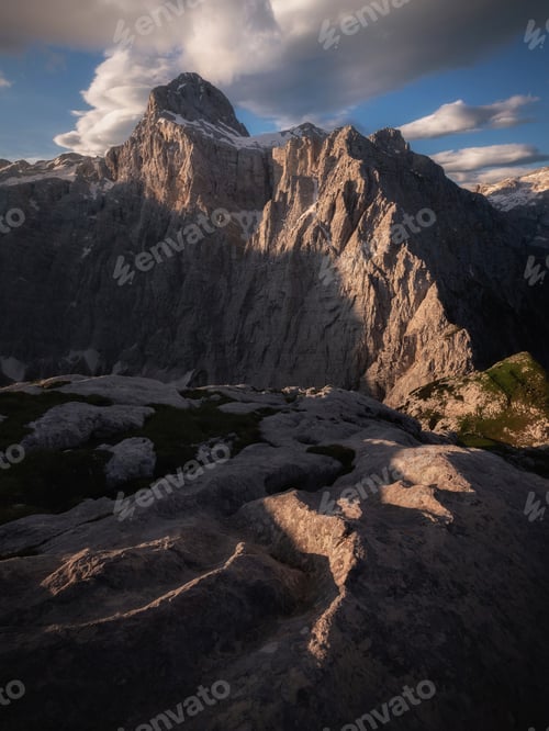 Preview: Dramatic sunrise light on the slopes of a mountain