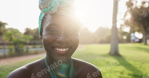 Preview: Portrait of african american woman smiling outdoor - Soft focus on mouth