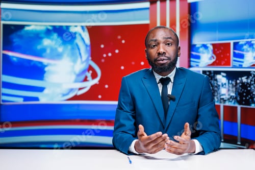 Preview: News anchor man reading media papers