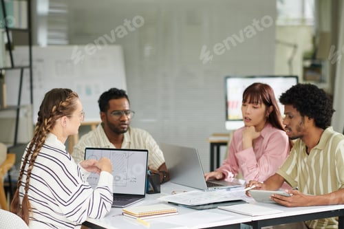 Preview: Team Discussing Mobile App Update