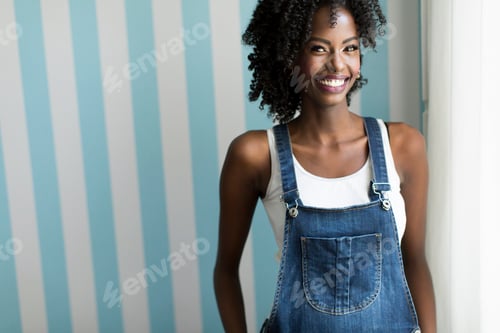 Preview: Woman posing by the wall