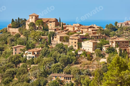 Preview: Traditional stone houses and tramuntana mountains in Deia. Mallorca, Spain