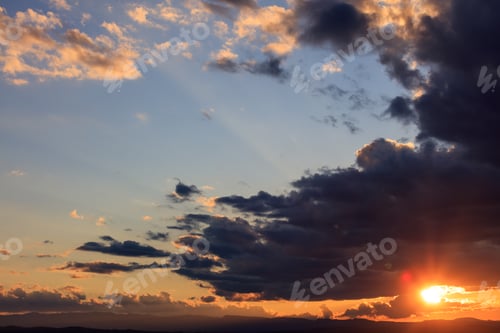 Preview: Dark clouds over sunset