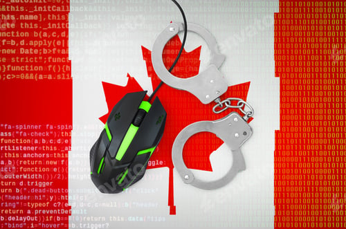 Preview: Canada flag and handcuffed modern backlit computer mouse