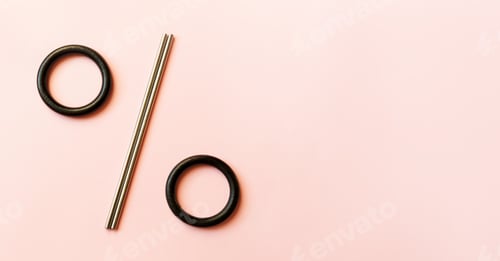 Preview: Percentage Symbol Made of Rings and Metal Straw