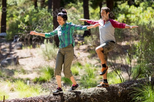 Preview: Couple smiling and walking with balance