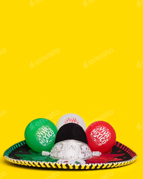 Preview: Mexican mariachi hat and balloons with text Viva Mexico, yellow background.