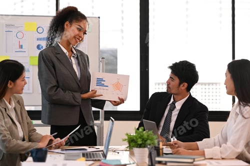 Preview: Confident female executive manager giving presentation, convincing business partners.