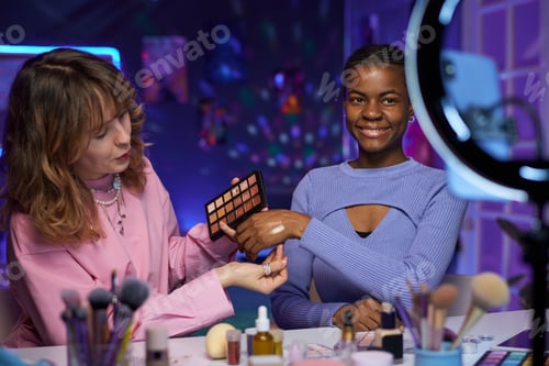 Preview: Two Women Testing Beauty Products