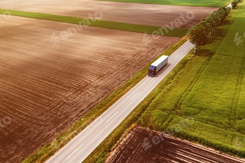 Preview: Large semi-truck on countryside road seen from drone pov, aerial shot