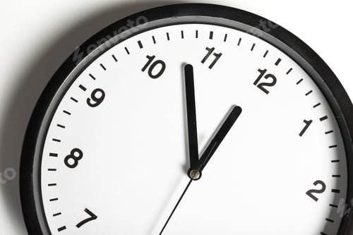 Preview: Clock showing almost eleven o'clock with a simple black and white design