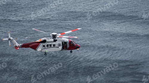 Preview: Coastguard helicopter flying over the sea in Scotland
