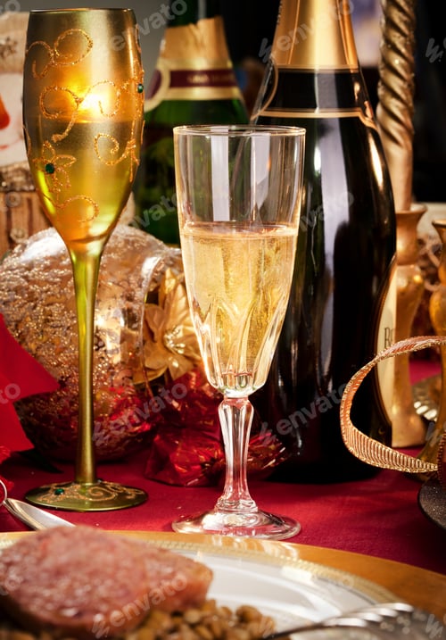 Preview: A Glass of Champagne on a decorated Christmas day dinner table