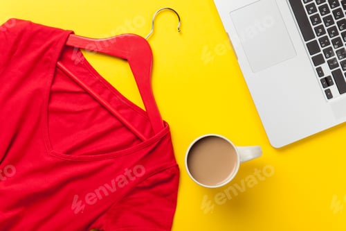 Preview: Red Shirt on Hanger with Laptop and Coffee