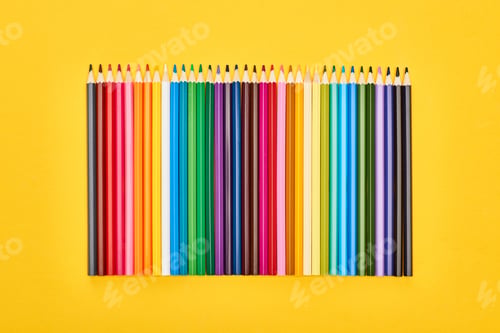 Preview: Panoramic Shot of Sharpened Color Pencils Isolated on Yellow