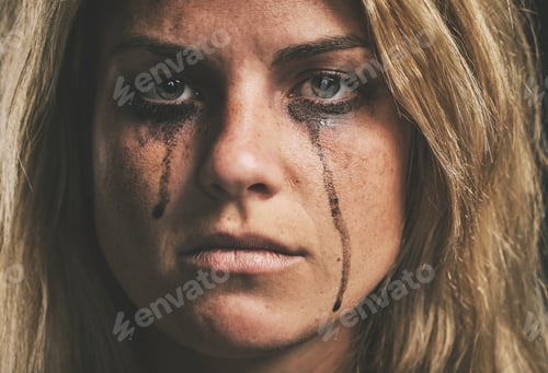 Preview: Face, crying and domestic violence with a woman victim of abuse in studio with makeup closeup. Sad,