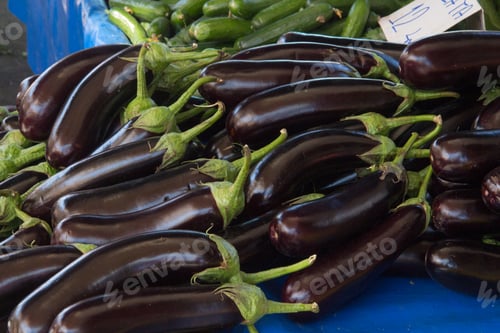 Preview: Eggplant in the window of the local market. A bunch of fresh eggplant close-up