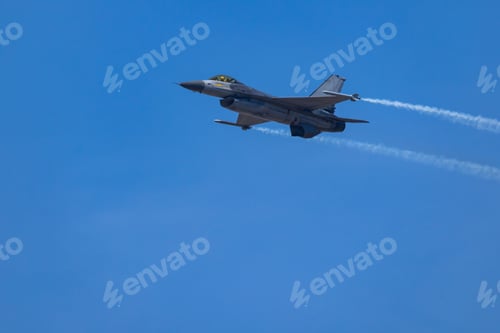Preview: Fighter Jet Climbing with Vapor Trail in Sky