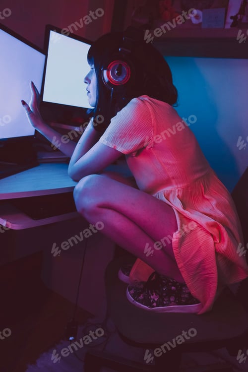 Preview: Young streamer woman working at night from home