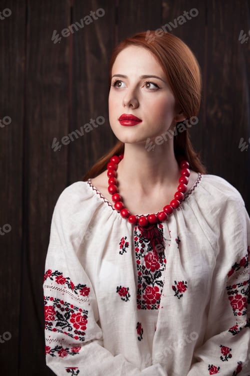 Preview: Redhead girl in ukrainian national clothing.