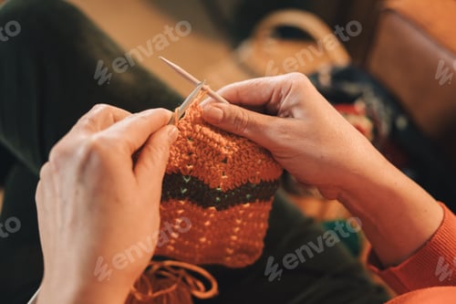 Preview: Hands Knitting with Wool and Needles Indoors