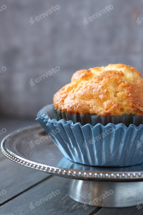 Preview: Delicious Muffin in a Blue Paper Liner